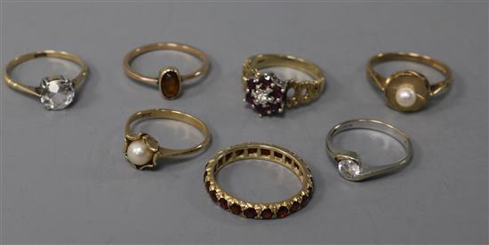 Seven assorted 9ct gold and gem set dress rings.